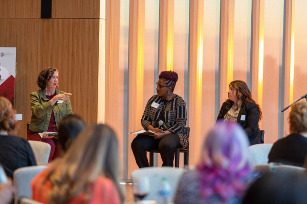Krystal Payne, Executive Director, facilitates a Fireside Chat with Megan Hougard, Chief of College and Career Success at Chicago Public Schools (left), and Dawn Ramos, Principal at Tilden Career Community Academy (right).